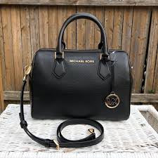 M K Sling Duffle Hand Bags