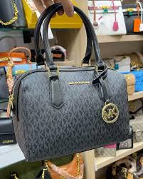 M K Sling Duffle Hand Bags