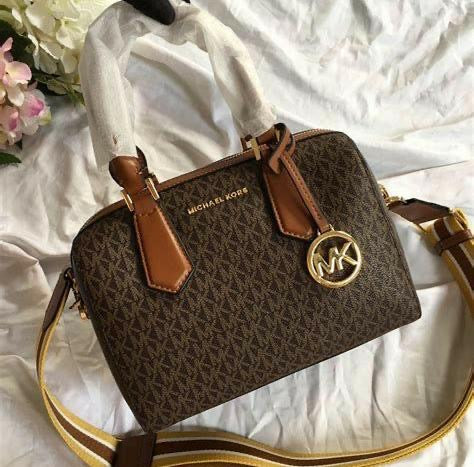 M K Sling Duffle Hand Bags