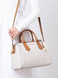 M K Sling Duffle Hand Bags