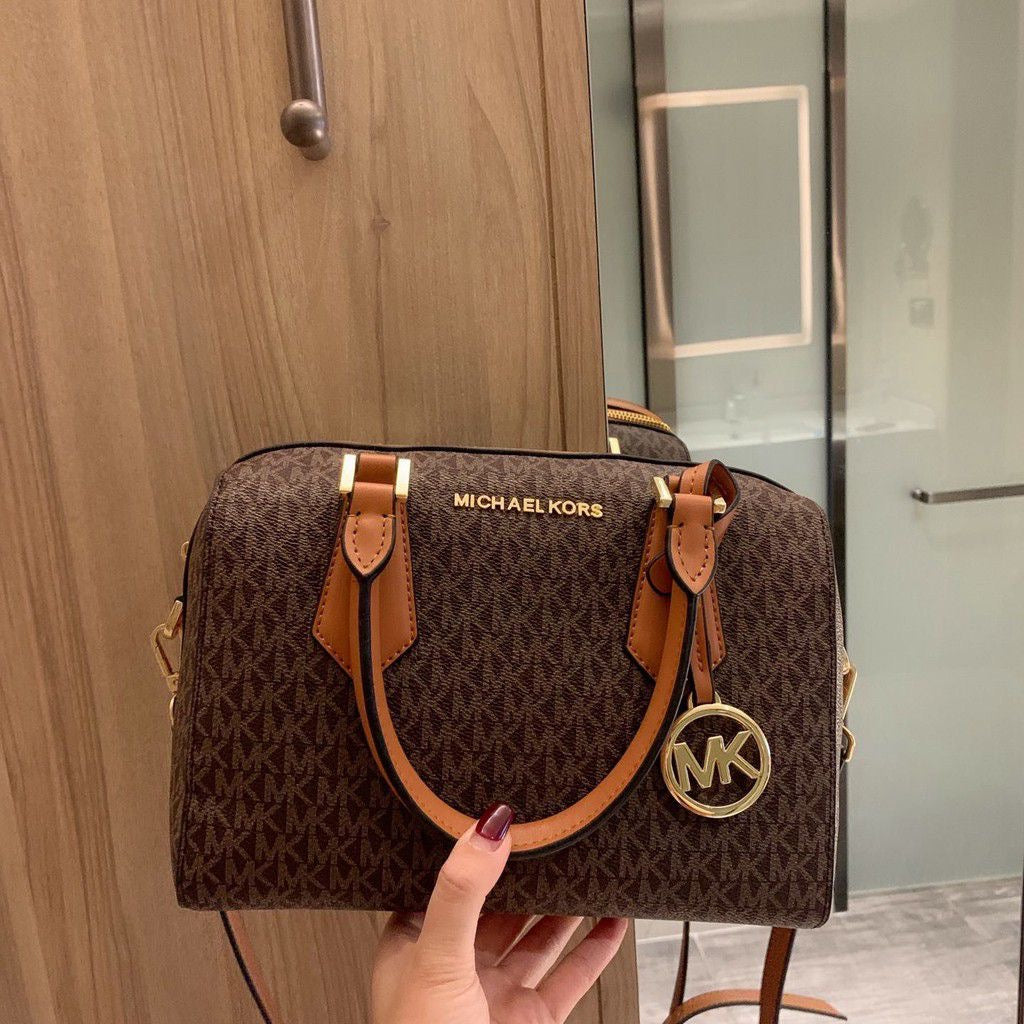 M K Sling Duffle Hand Bags