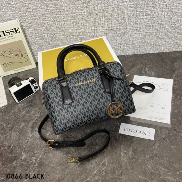 M K Sling Duffle Hand Bags