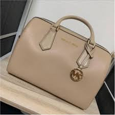 M K Sling Duffle Hand Bags