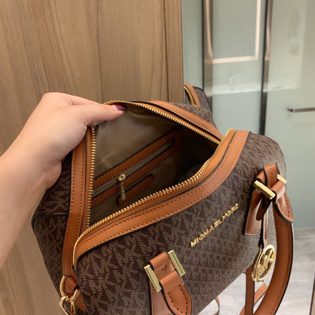 M K Sling Duffle Hand Bags