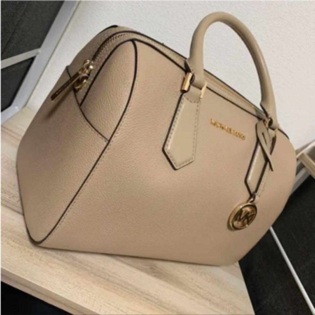 M K Sling Duffle Hand Bags