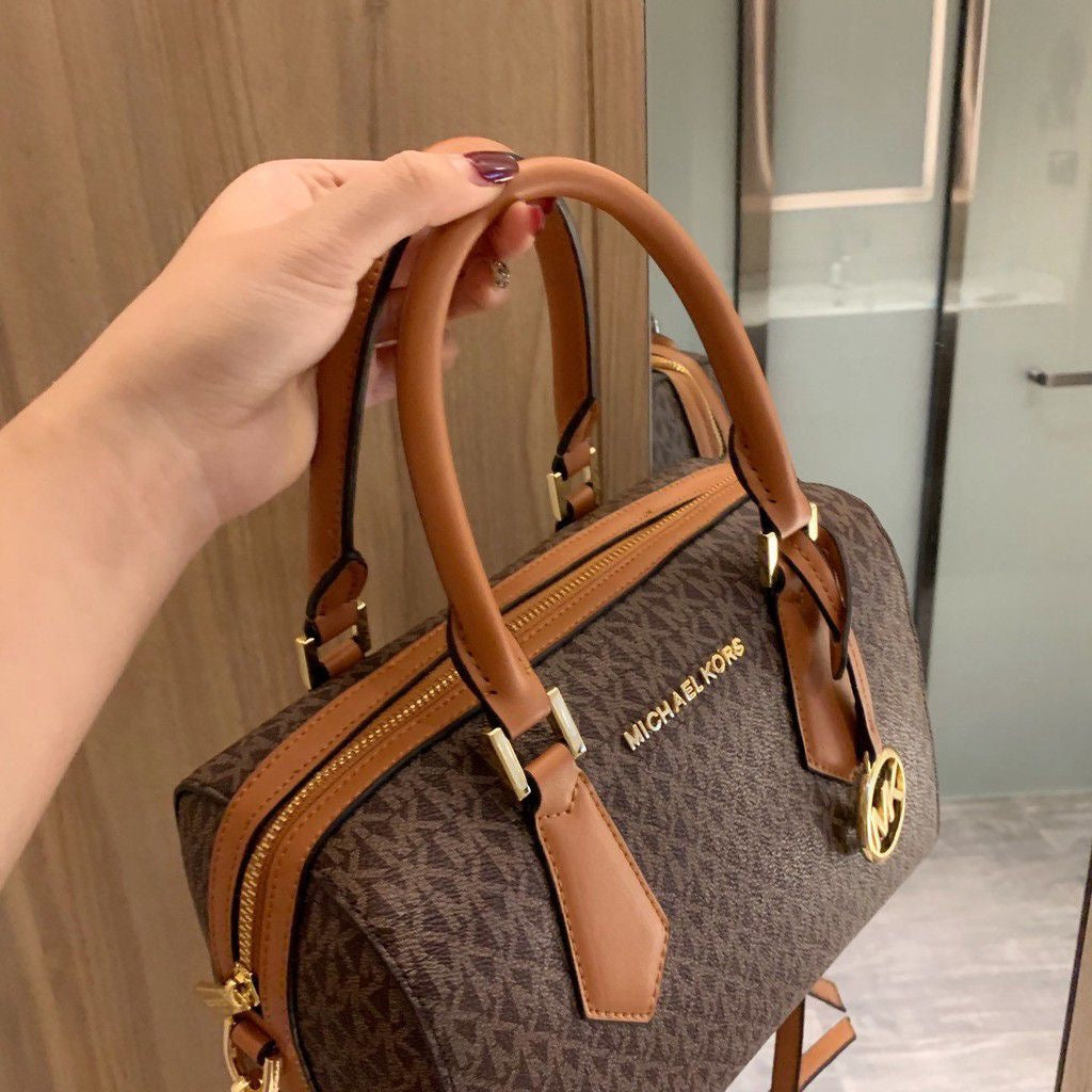 M K Sling Duffle Hand Bags